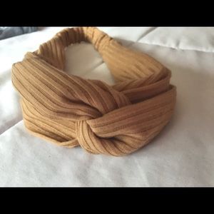 Brand new - never worn - headband variety.
